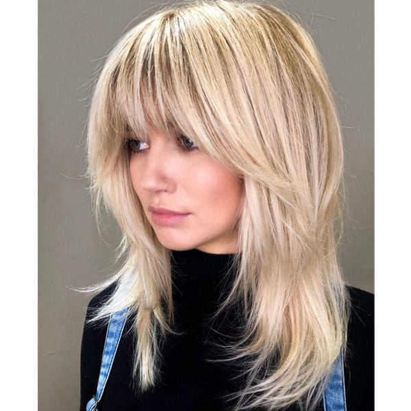 Image of Shaggy layered Rachel haircut with curtain bangs